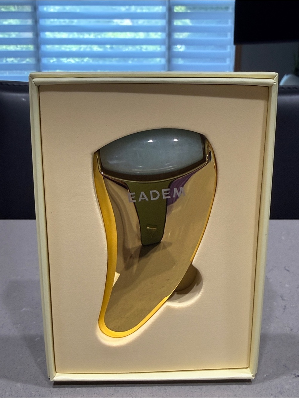 Eadem The Chisel 2-in-1 gua sha with a cooling jade roller.  New/Unused